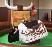 Hire a Rodeo Bull with themed inflatable mattress from Rodeobulls.co.uk